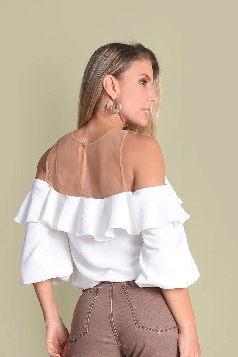 Blusa manga larga con volantes